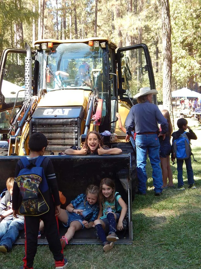 kids playing on tractor