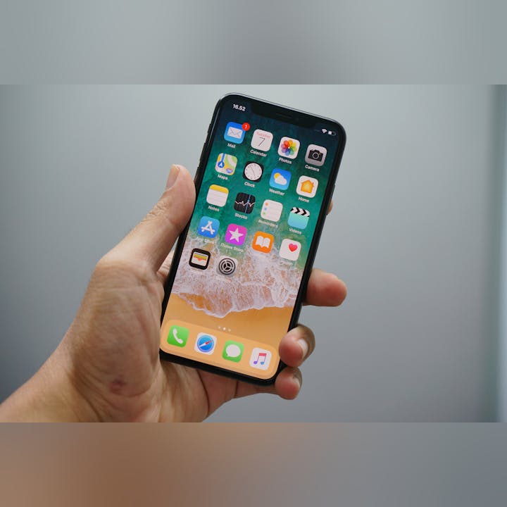 May contain: person, human, mobile phone, cell phone, phone, and electronics