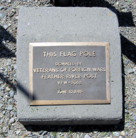 Plaque indicating donation of a flag pole by Veterans of Foreign Wars, Feather River Post, dated June 10, 1989.