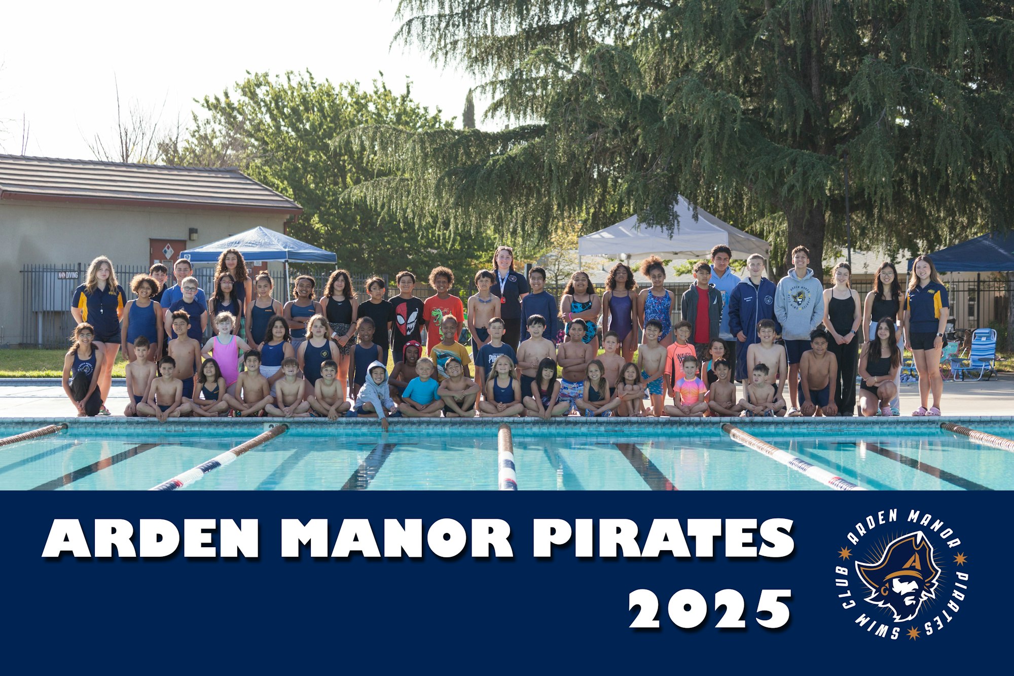 A large group photo of the Arden Manor Pirates swim team for 2025, gathered by a pool, showcasing athletes of various ages.