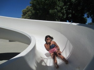 May contain: slide, toy, person, and human