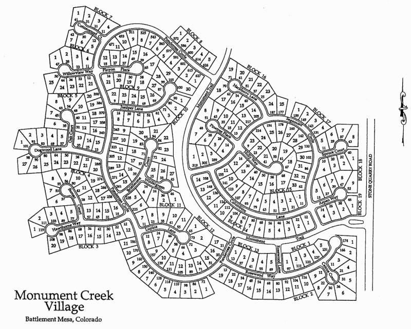 Map of Monument Creek Village in Battlement Mesa, Colorado, showing street layouts and block numbers.