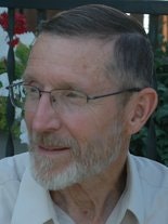 Gary Dielman, library volunteer archivist, pictured at about age 75; adult, male, with glasses.