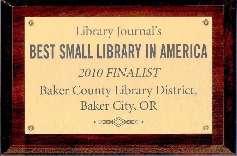 A plaque recognizing the Baker County Library District in Baker City, OR, as a 2010 finalist for "Best Small Library in America."