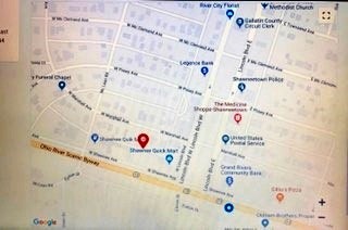 A map showing locations in Shawneetown, including a bank, police station, post office, and quick mart along Ohio River Scenic Byway.