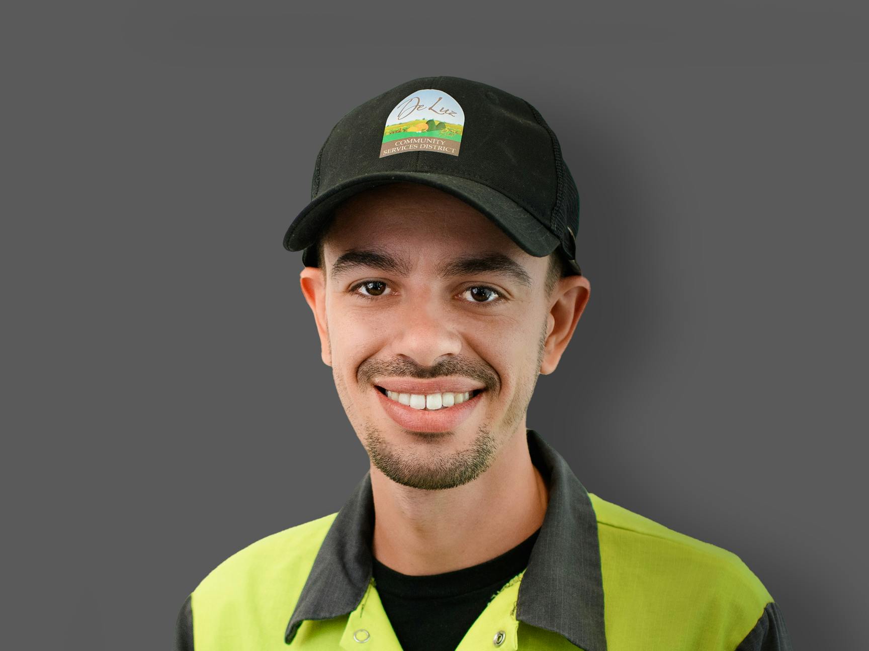 May contain: baseball cap, cap, clothing, hat, face, head, person, photography, portrait, adult, male, man, happy, and smile