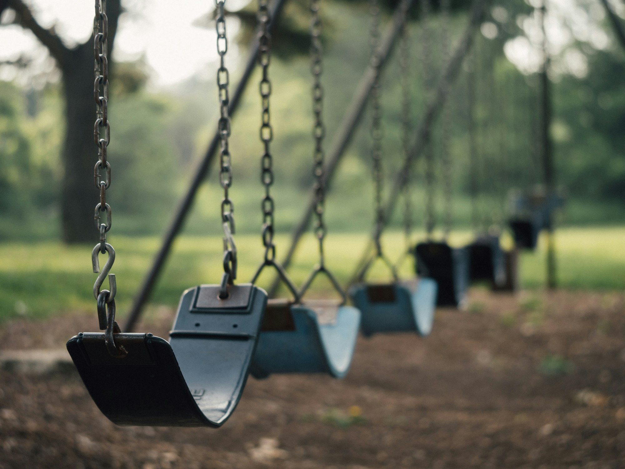 May contain: playground, play area, toy, and swing