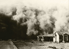 A large dust storm approaching a row of houses, resembling scenes from the Dust Bowl era.