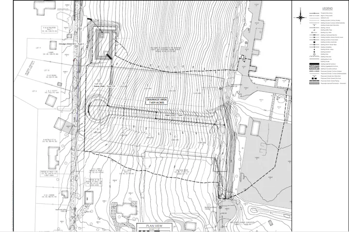 Topographical map of a drainage area (7.439 acres) with contour lines, building footprints, and a legend.