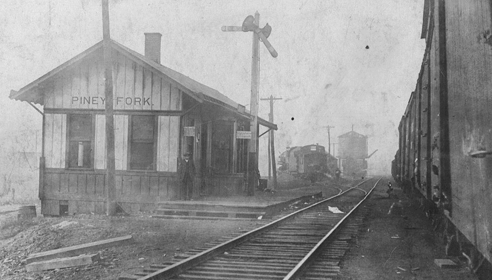 May contain: terminal, railway, train, train station, transportation, vehicle, architecture, building, and person