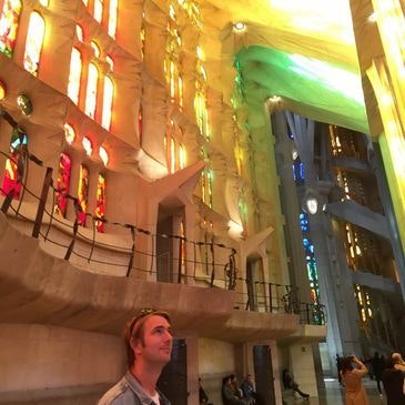 May contain: lighting, urban, city, adult, female, person, woman, altar, architecture, building, church, prayer, and art