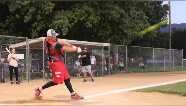 May contain: people, person, baseball, baseball bat, sport, baseball game, playing baseball, and helmet