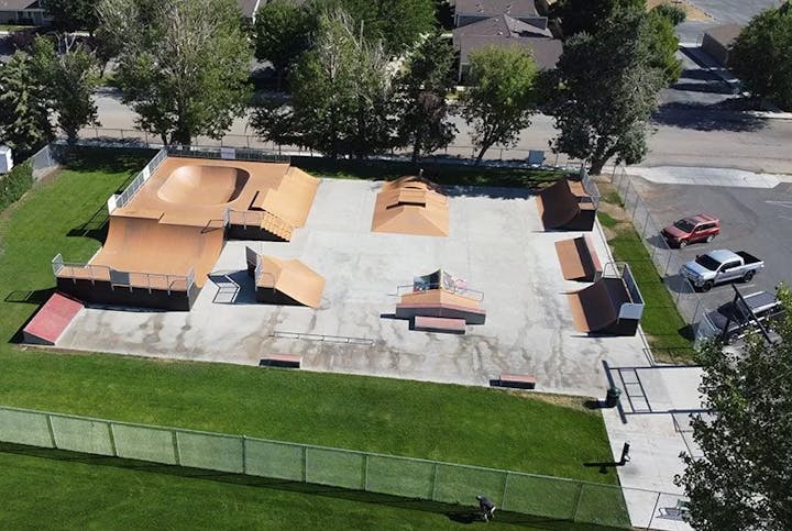 May contain: outdoors, architecture, building, housing, aerial view, person, driveway, and house