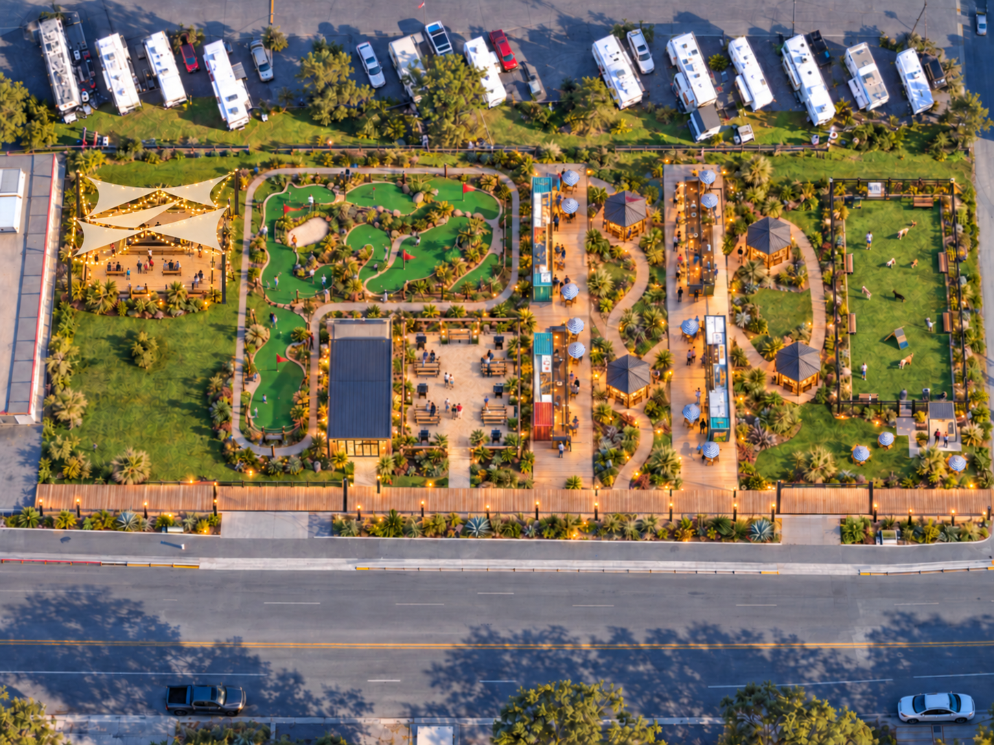 Aerial view of a vibrant outdoor space with mini-golf, seating areas, and food trucks, surrounded by greenery and parked RVs.