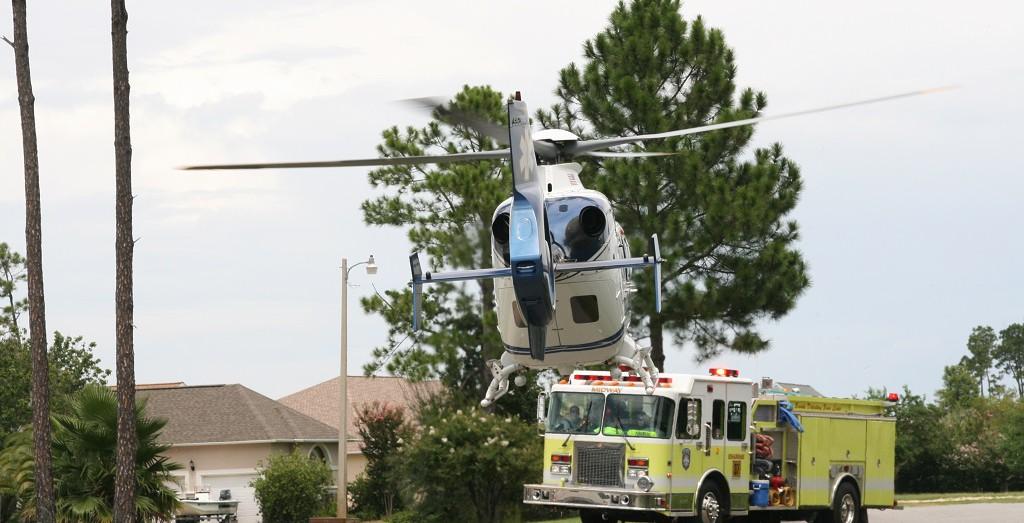 Photo of helicopter and a fire truck