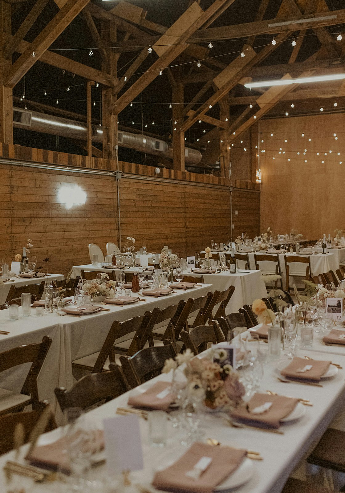 May contain: indoors, architecture, building, dining table, furniture, table, hall, interior design, and restaurant