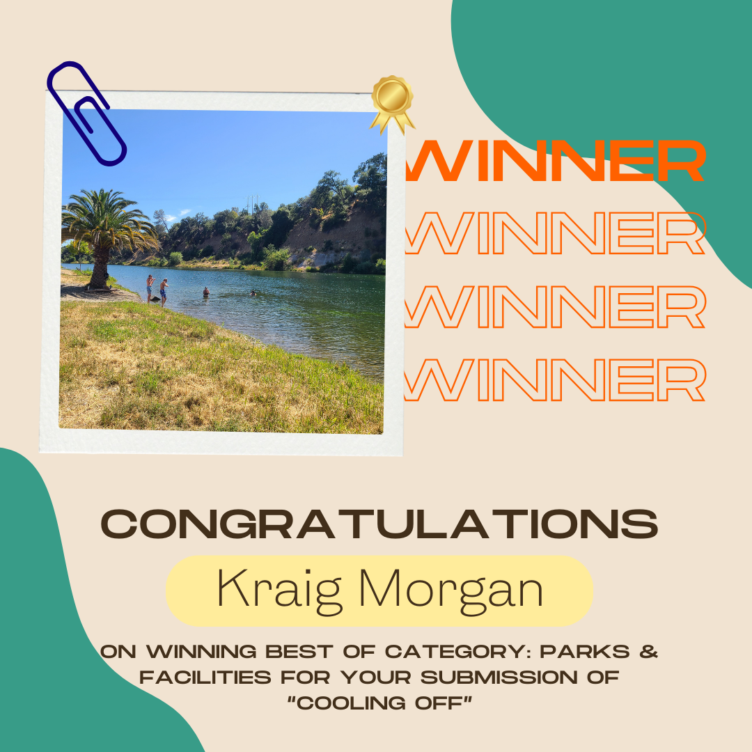 Photo of people by a river, with "Winner" and "Congratulations Kraig Morgan" text celebrating a parks photo contest.