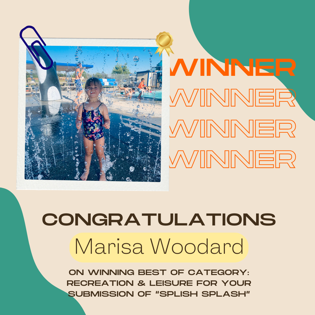 Winner announcement featuring a child in a swimsuit playing with water, congratulating "Marisa Woodard" for "Splish Splash."