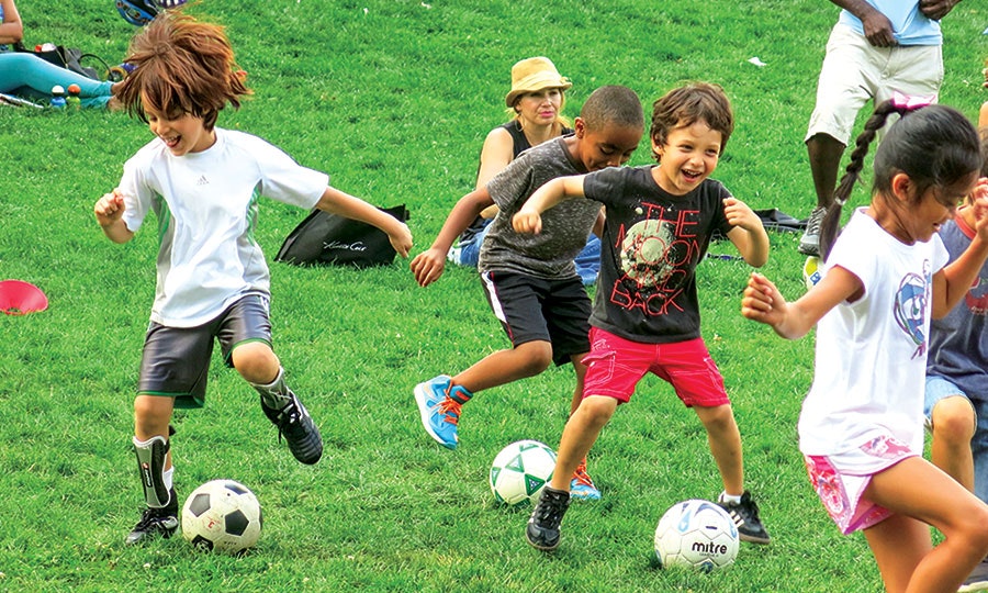 May contain: person, human, sports, soccer, ball, team sport, football, soccer ball, people, sport, and team