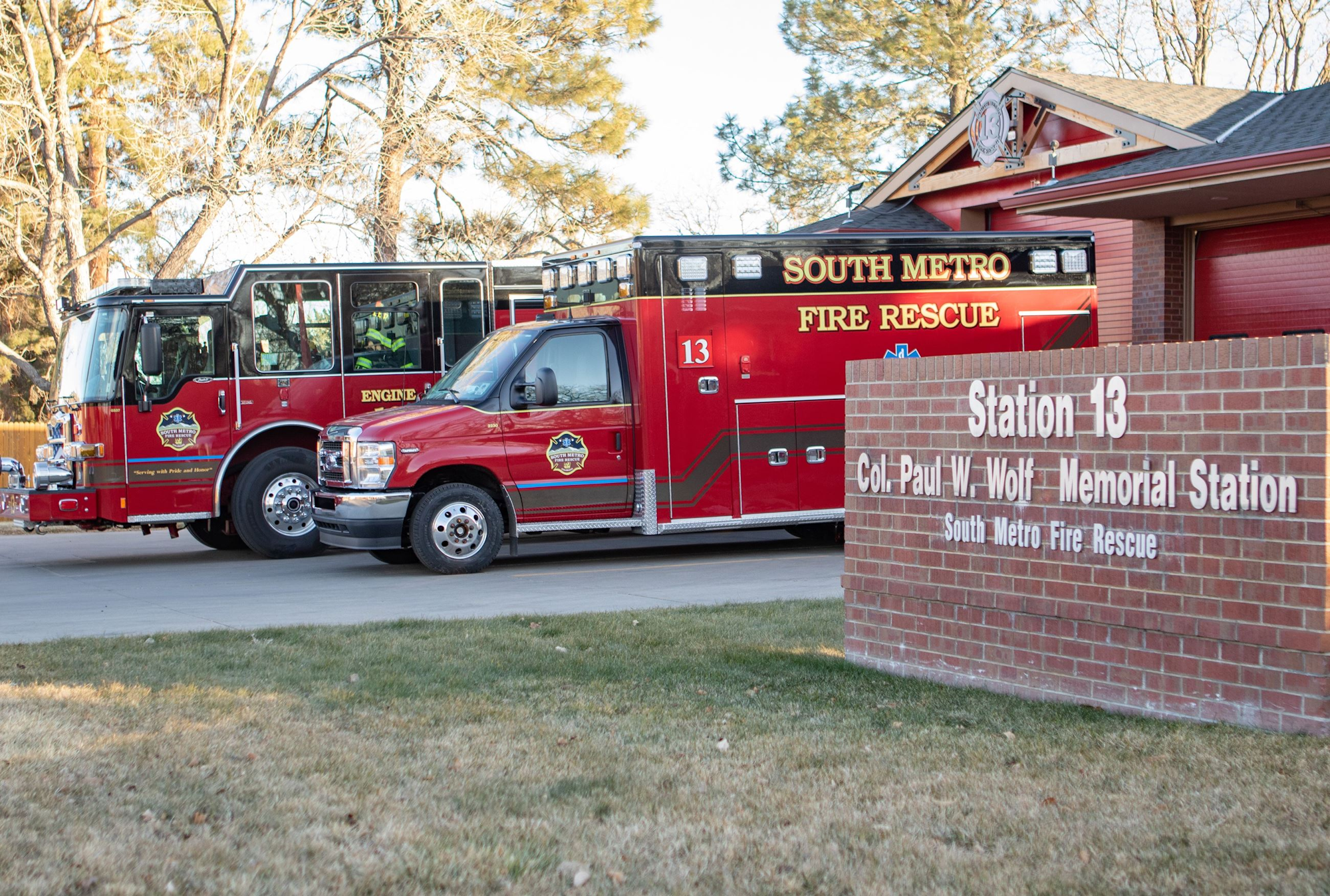 Fire trucks parked outside Station 13, Col. Paul W. Wolf Memorial Station, South Metro Fire Rescue.