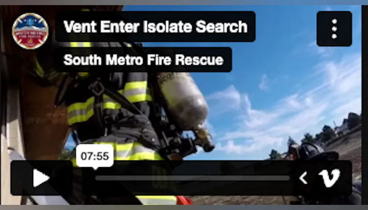 The image shows a video player for a South Metro Fire Rescue training video titled "Vent Enter Isolate Search."