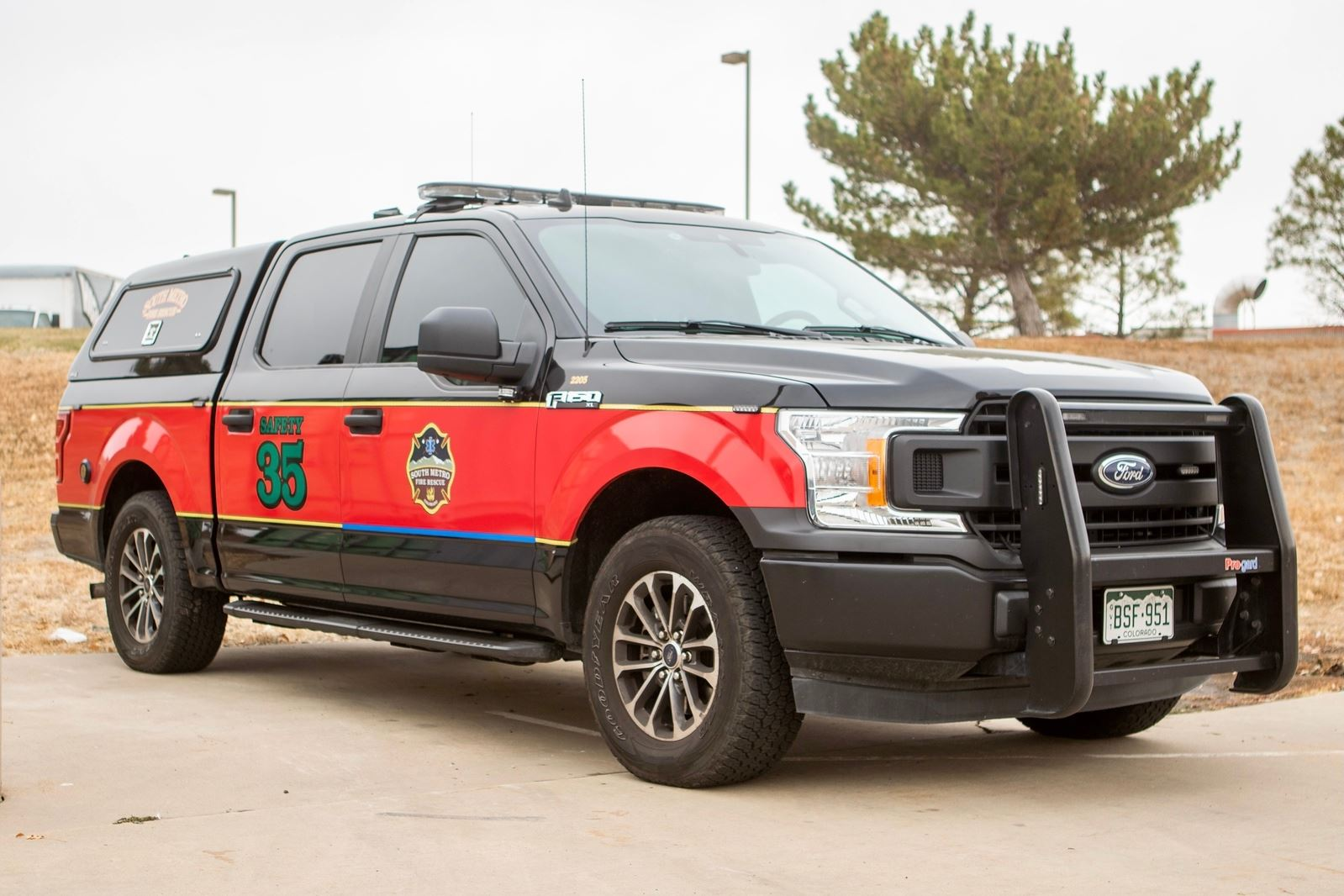 Ford F-150 truck in fire department livery with "Safety 35" on the side.
