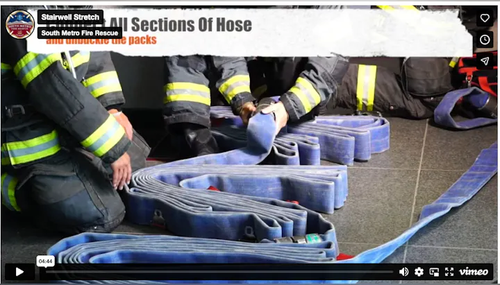 Firefighters are seen preparing and organizing sections of hose for a firefighting procedure, labeled "Stairwell Stretch."