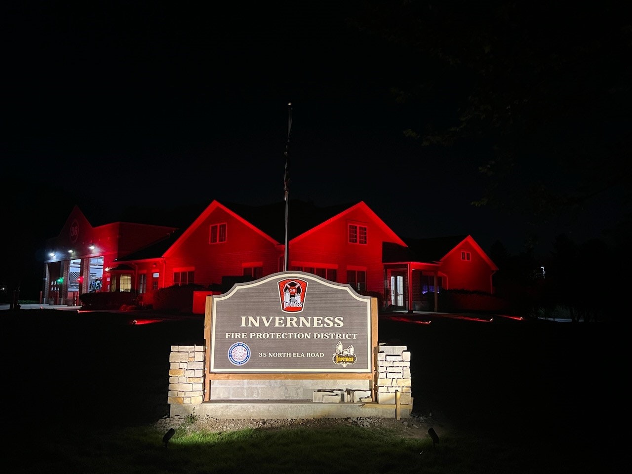 Inverness Fire sign with Station in background
