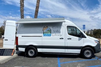 white van outside in a parking lot