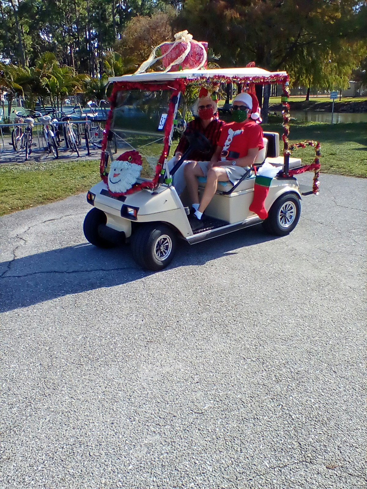 May contain: person, human, golf cart, vehicle, and transportation