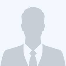 Silhouette of a person wearing a suit and tie, with a neutral background.