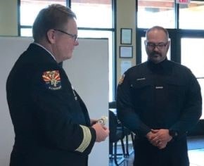 Paramedic Jeff Little with Chief Delfs.