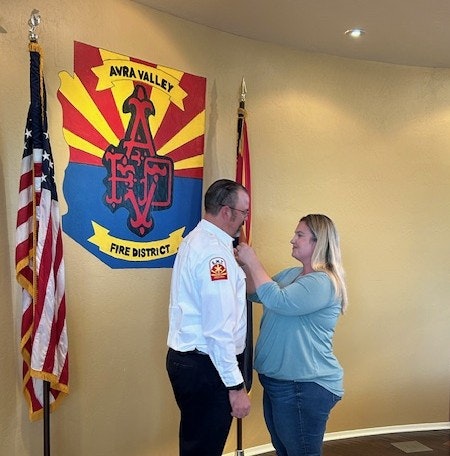 Chief Bowden receives his badge. 2-26-26