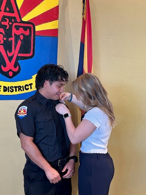 Firefighter Ramirez receives his badge 2-26-26
