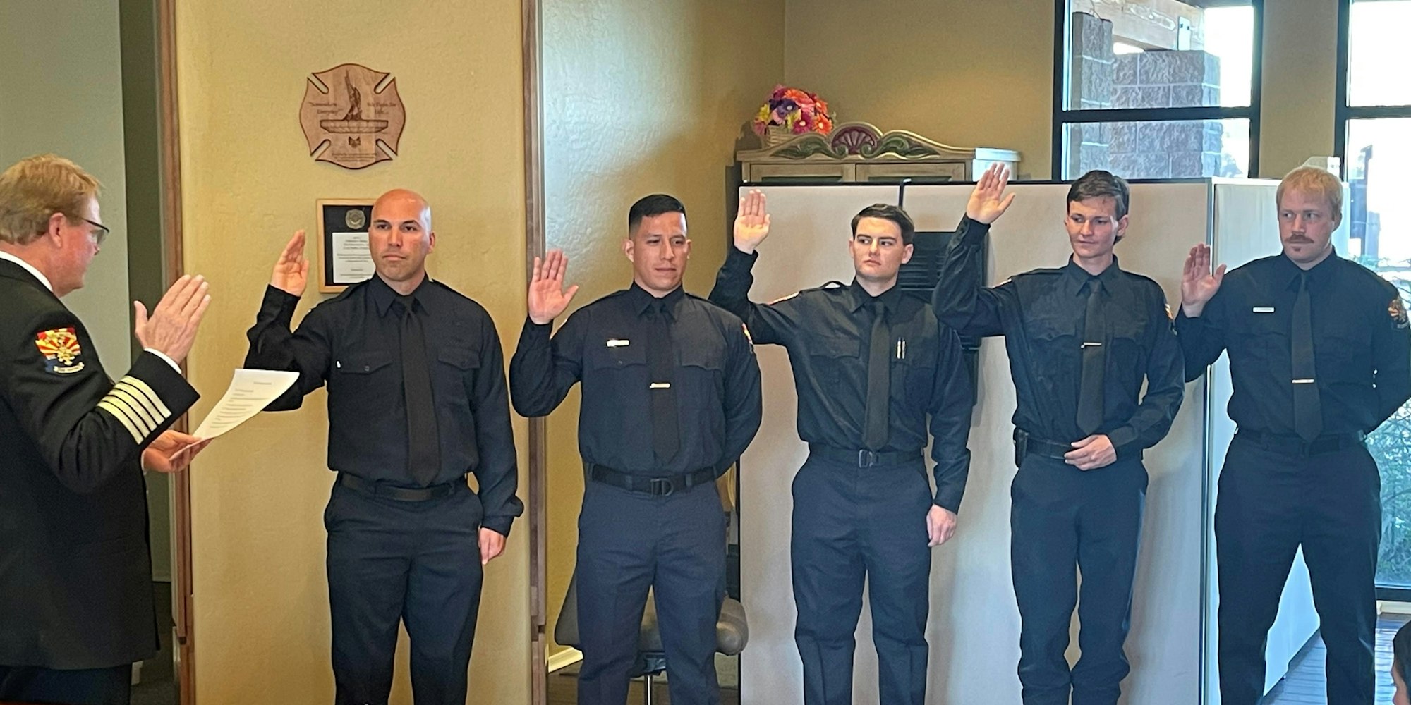 group swearing-in new firefighters, April 2022