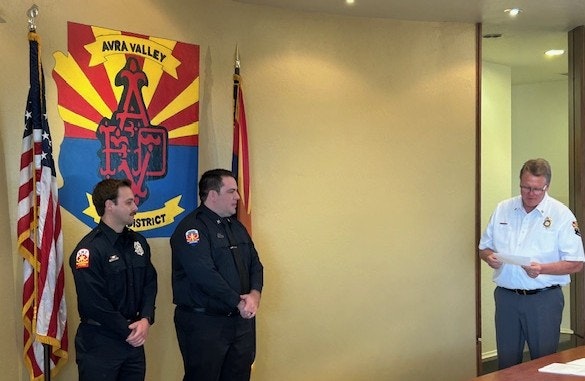 Chief Delfs congratulates Captan Merz and Captain Seitz 2-26-26