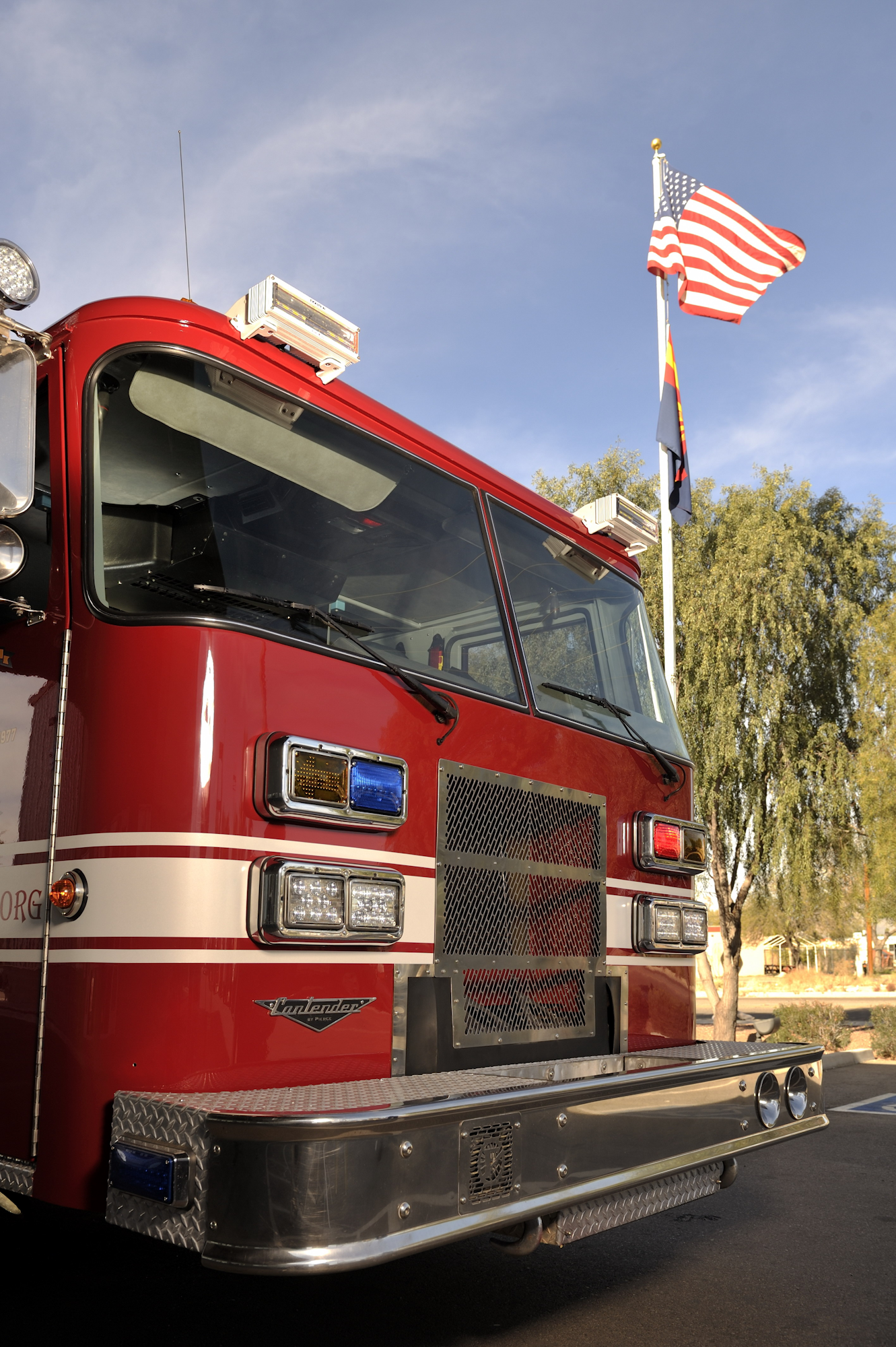 May contain: flag, fire truck, transportation, truck, and vehicle