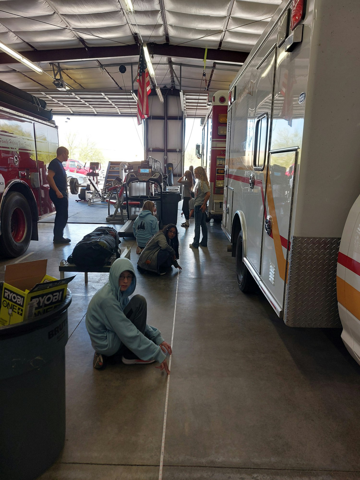 RR GATE students measuring in the apparatus bay March 2025