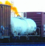 May contain: railway, transportation, vehicle, shipping container, and freight car