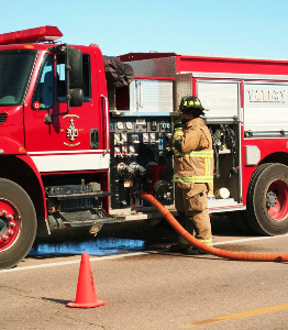 May contain: helmet, person, transportation, vehicle, truck, and fire truck