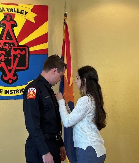 Firefighter Evan Snider receives his badge 3-27-25.