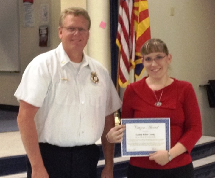 Mrs. Laura Coody presented with special award from Chief Delfs
