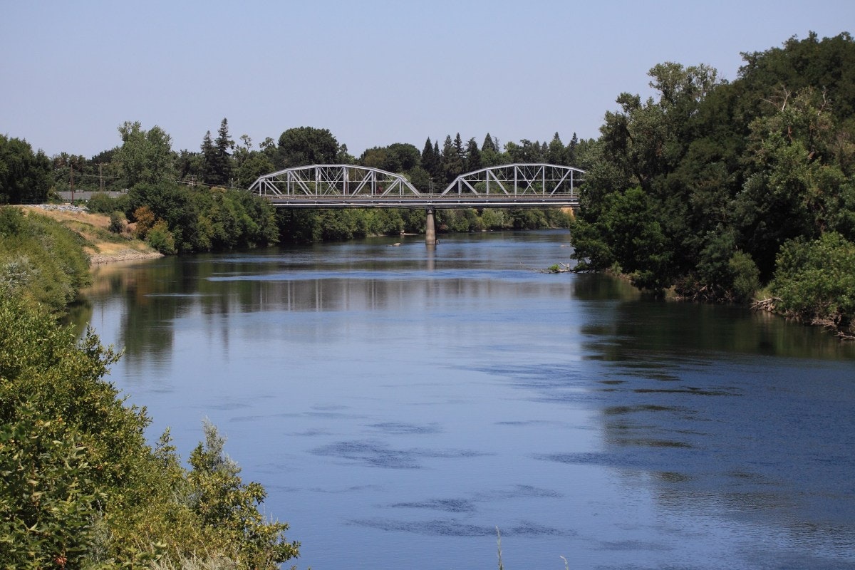 May contain: building, architecture, outdoors, bridge, water, arch bridge, arch, and arched