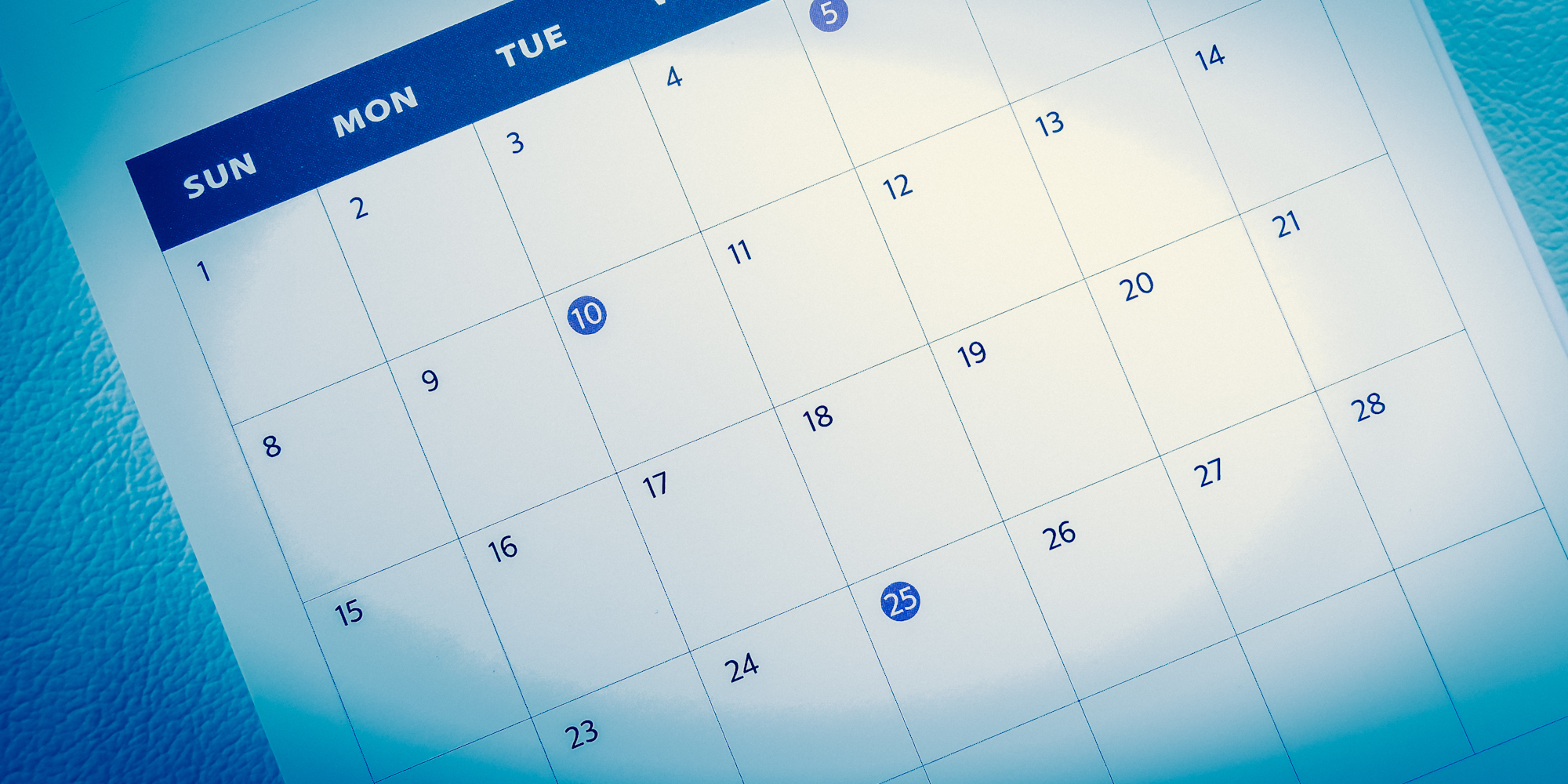 A calendar page showing dates with specific highlights on the 10th and 25th.