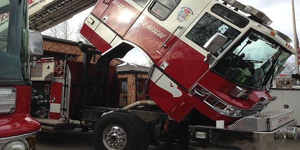 Cab of fire engine open for maintenance work