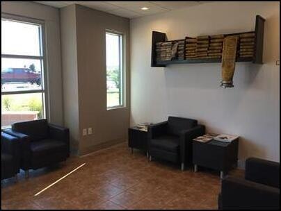 May contain: indoors, reception, reception room, room, waiting room, architecture, building, furniture, living room, interior design, couch, floor, and flooring
