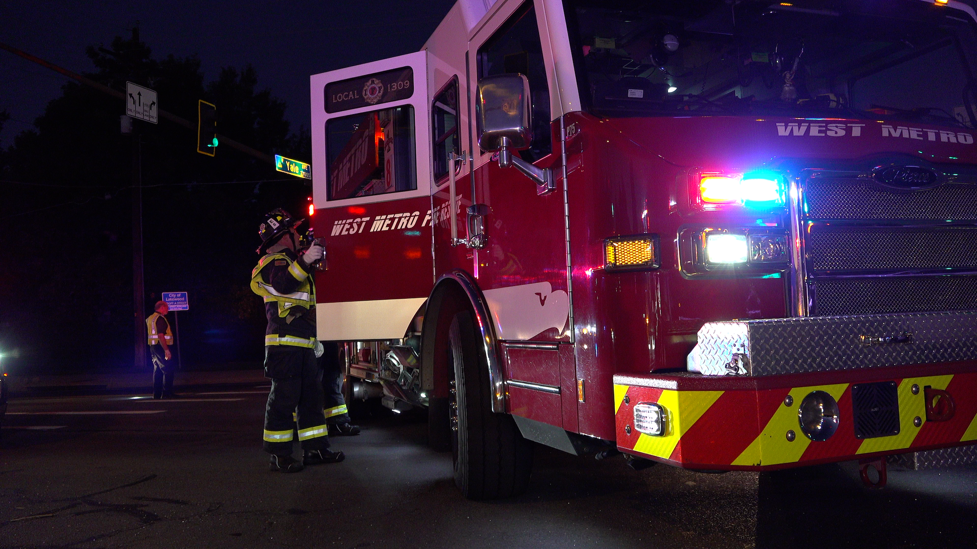 West Metro Engine 8 operating on scene of a vehicle crash at night.