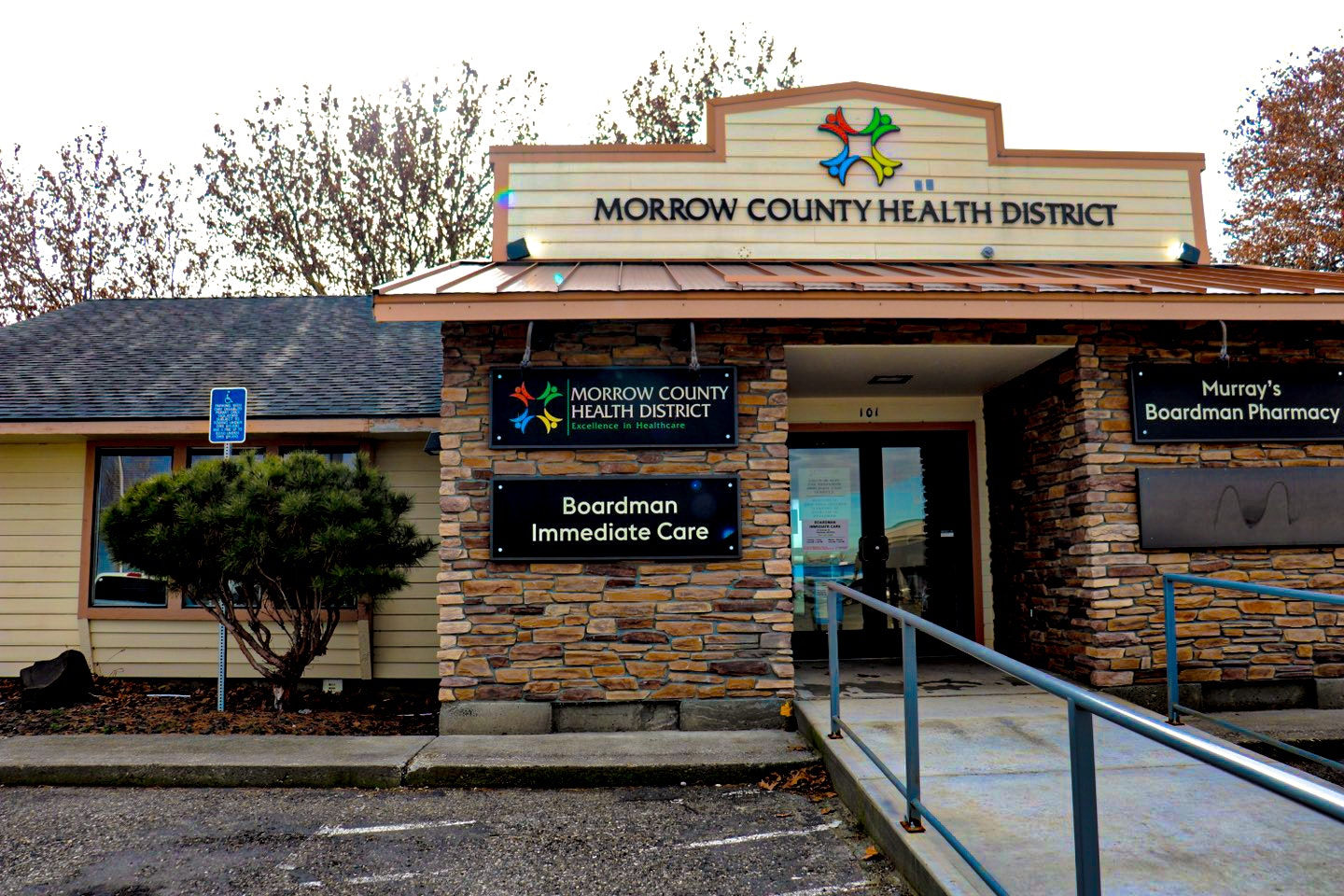 Exterior of Morrow County Health District building with signs for Boardman Immediate Care and pharmacy.