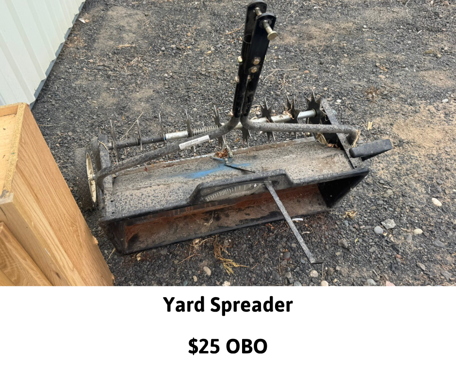 Yard spreader for sale, $25 or best offer, on a gravel surface.