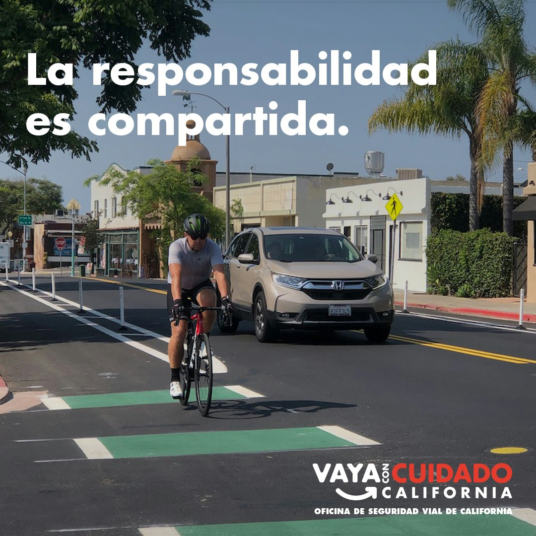 The image shows a cyclist on a bike lane with a message about shared responsibility for safety in California.